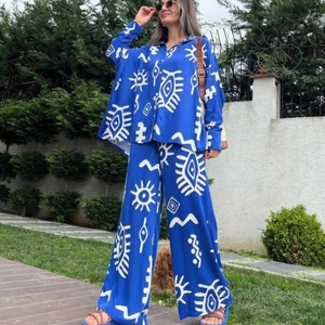 Women stylish royal blue two-piece set with white abstract prints and wide-leg trousers