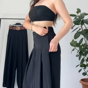 Women's black high-waisted wide-leg pants and bandeau top set with elastic waist