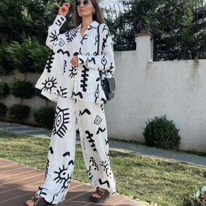 Women's 2-piece set with long sleeve shirt and wide leg pants in abstract eye print