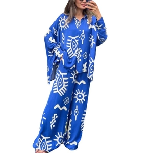 Women's 2-piece lounge set with navy blue abstract print shirt and high waist wide-leg pants