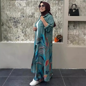 Women's teal printed long cardigan and wide-leg trousers set with abstract leaf patterns