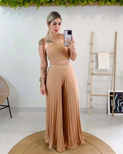 Close-up of pleated texture on camel two-piece set featuring camisole and wide-leg pants