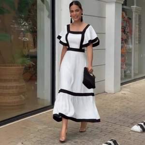 Elegant white A-line dress with black contrast trim, square neck and ruffle sleeves