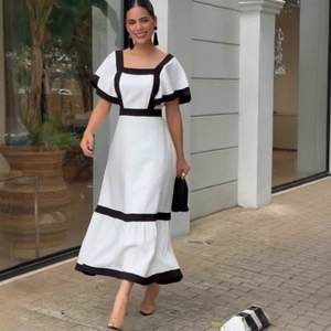 Elegant white square neck dress with black contrast trim and flared sleeves in midi length