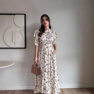 Elegant ivory floral satin maxi dress with puff sleeves and cinched waist for women
