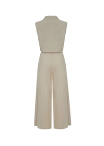 Back view of beige two-piece sleeveless vest and high-waist wide-leg trousers set