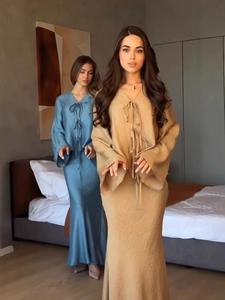 Elegant women's pleated two-piece set with tie-front long sleeve top and slim maxi skirt