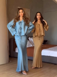 Elegant two-piece set for women featuring pleated tie-up top and matching maxi skirt