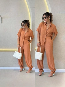 Women's 2-piece set featuring pleated short sleeve shirt and high waist jogger trousers