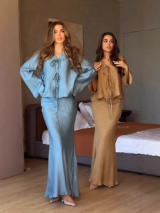 Women's pleated long sleeve wrap top and maxi skirt set in blue and bronze satin fabric