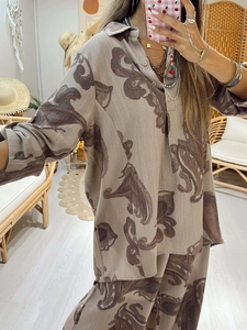 Bohemian paisley print two-piece set featuring loose long sleeve shirt and wide leg pants