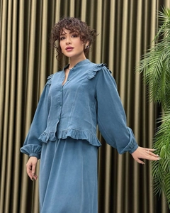Detailed texture of Morandi blue long sleeve top with ruffle trim and lantern sleeves