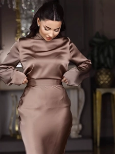 Elegant high-neck long-sleeve satin top and maxi skirt set in champagne brown finish