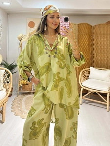 Detail of green paisley print long sleeve shirt and wide leg pants two piece set