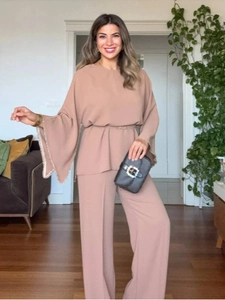 Women's 2-piece lounge set with flare sleeve top and wide leg pants in dusty rose