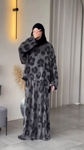 Detail of 2-piece set featuring gray and black leopard print modest maxi skirt and top