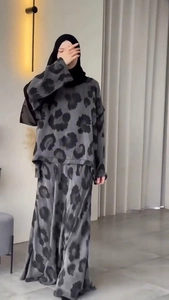 Detail of Muslim-style set featuring abstract leopard print blouse and flowing maxi skirt