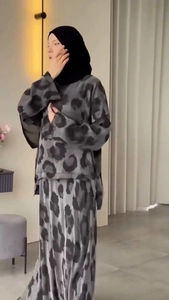 Detailed view of modest two-piece set featuring grey leopard print top and maxi skirt