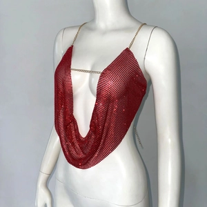 Detail of red rhinestone mesh halter top with metallic chain and sparkling crystals