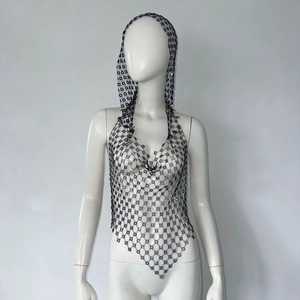 Detailed view of sexy black fishnet top with rhinestones and matching hooded headpiece