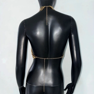 Detailed back view of gold sequin halter top with adjustable metal chains for music festivals
