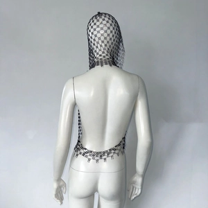 Macro detail of sexy black rhinestone mesh hood and back straps for party wear