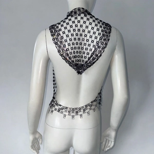 Detailed back view of a sexy black rhinestone fishnet hooded top with floral net patterns