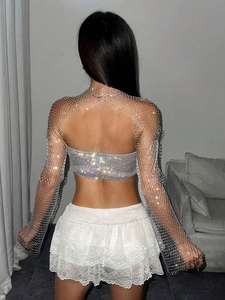Sparkly rhinestone mesh long sleeve top with open back design for music festivals