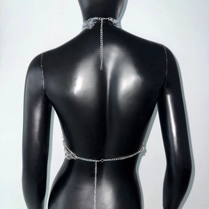 Detail of silver metallic mesh halter body chain with adjustable back chain and lobster clasp