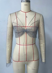 Detailed view of silver mesh top with rhinestones and front bow tie design