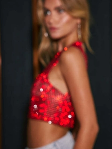 Sparkly red sequin crop top with metallic chain straps and sexy backless design