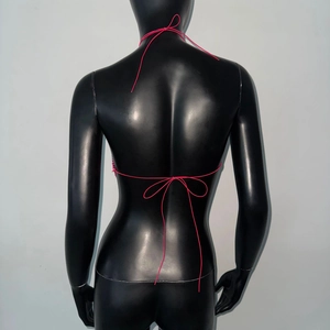 Detail of rose pink rhinestone top with delicate halter neck and back tie-up bows
