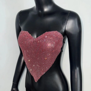 Detail view of sparkly pink rhinestone heart tube top with adjustable black back straps