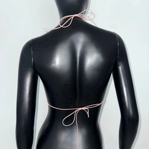 Detailed back view of pink rhinestone bikini top showing adjustable lace-up straps