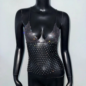 Detail of black fishnet camisole top with shimmering rhinestones and thin straps