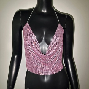 Detail of pink rhinestone metal mesh camisole with deep V-neck and silver chain straps