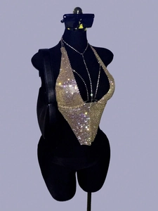 Macro view of crystal rhinestone halter top with triangular hem for party festivals