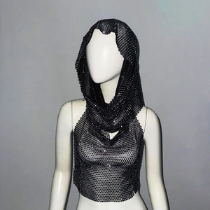 Detail of black metallic mesh hooded top with sequin texture for rave party outfits