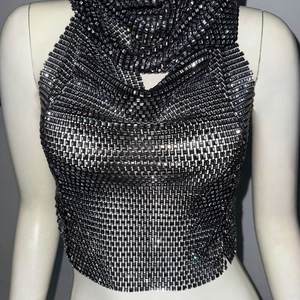 Close-up of charcoal gray rhinestone mesh halter top with metallic chainlink texture