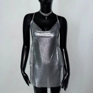 Close-up of silver sequin metal mesh mini dress with thin straps and draped V-neckline