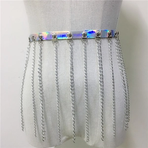 Detail of holographic fringe waist belt with metallic silver chains on a white background