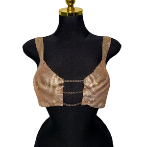Sparkling gold rhinestone halter top with metal mesh and chain detail for party
