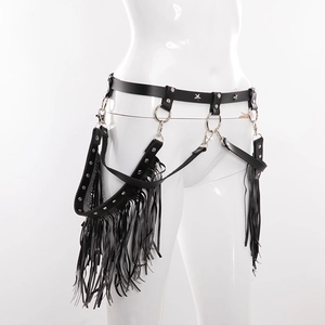 Detail of punk black leather fringe belt with silver metal rings and star rivets
