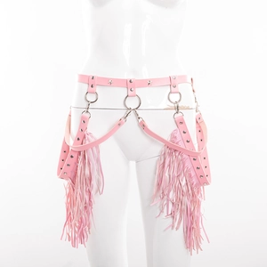 Pink punk leather body chain with star rivets and long fringe tassels on a white mannequin