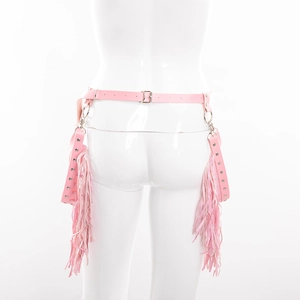 Detail of pink PU leather body harness with fringe tassels and metal punk rivets
