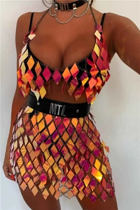 Detailed macro of iridescent sequin bra top and skirt with MTL metal letter accents