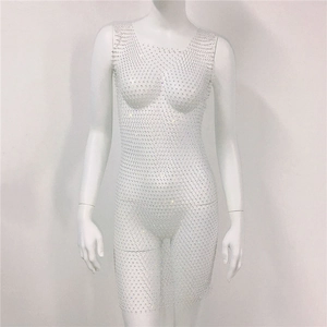 Detailed view of silver mesh dress with shimmering rhinestones and sleeveless design