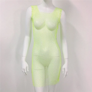 Close-up of fluorescent green rhinestone mesh dress with shimmering crystal details