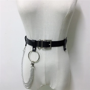 Detail of punk leather waist belt with silver square buckle and triple metal chain rings
