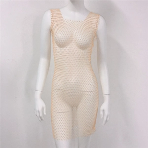 Detailed close-up of sparkling rhinestone mesh fabric on a sleeveless mini dress